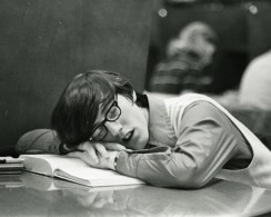 sleeping in the library -- black and white